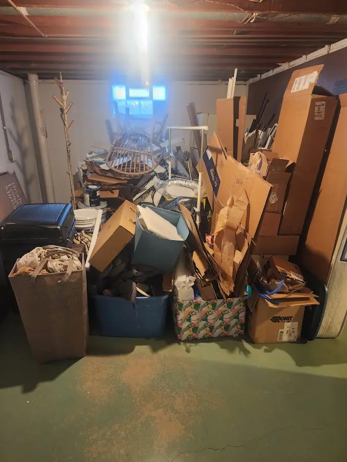 Roll-off dumpster container at job site for Yard Waste Dumpster Rental in Fairview